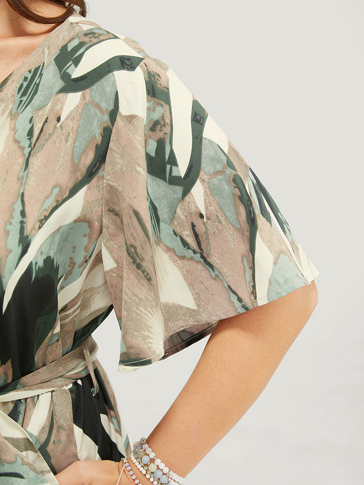 Allover Print Ruffle Hem Pocket Belted Wrap Dress