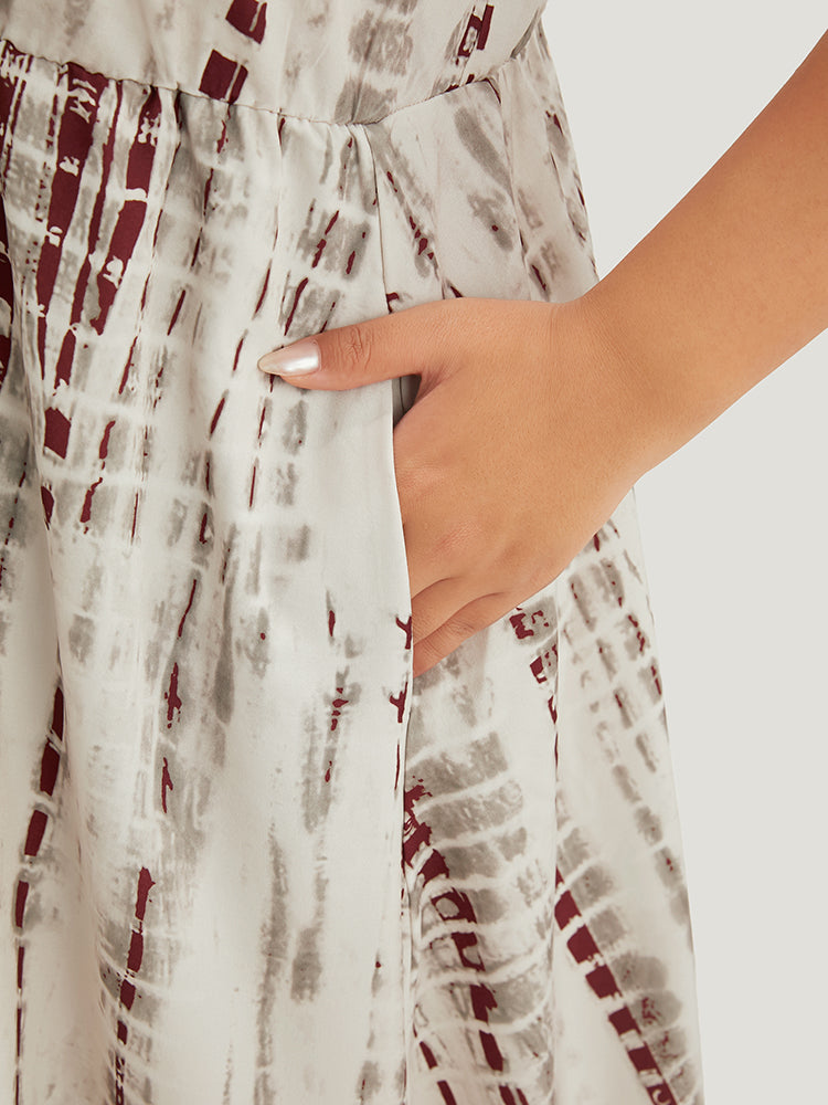 Tie Dye Wrap Pocket Flutter Hem Cami Dress