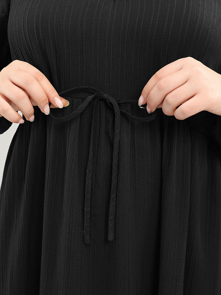 Solid Lantern Sleeve Pocket Textured Ties Up Flutter Dress