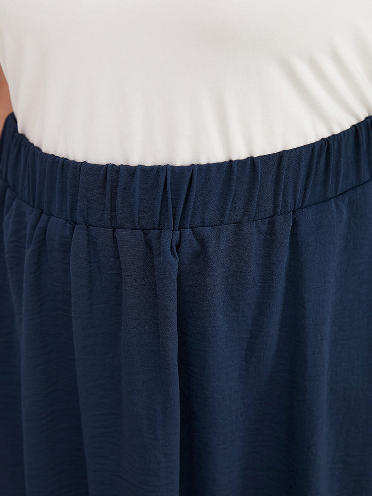 Plain Laser Cut Pocket Ruffle Hem Skirt