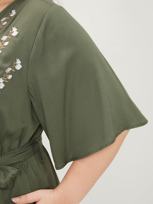 Floral Embroidered Wrap Pocket Belted Asymmetrical Hem Dress