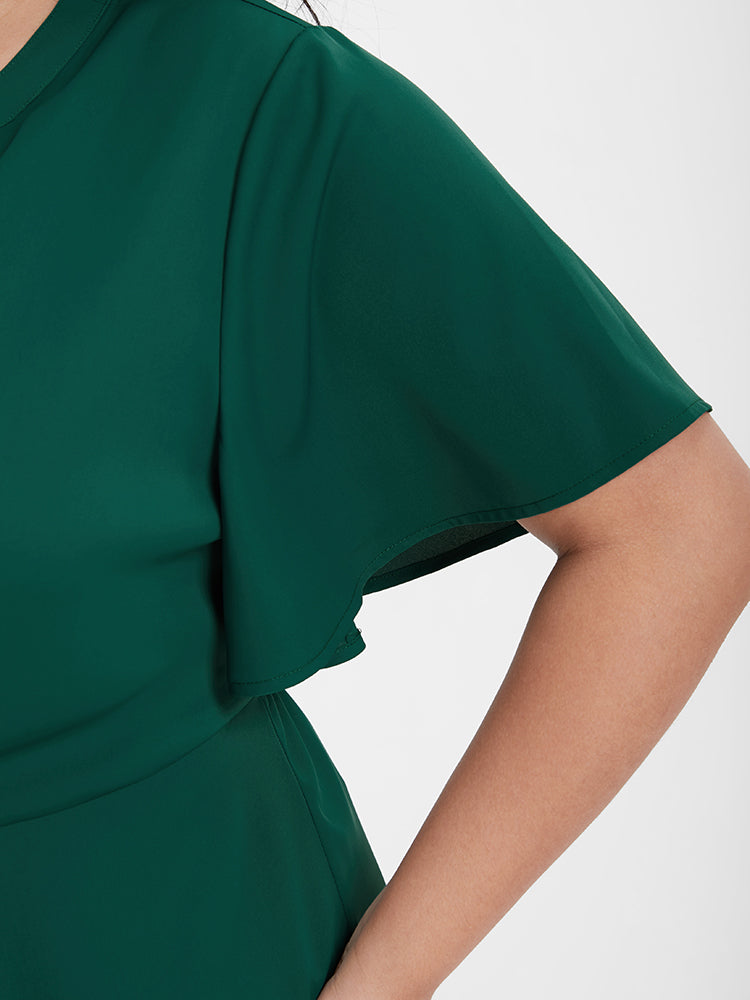 Solid Knotted Button Flutter Sleeve Blouse