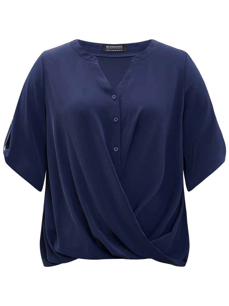 Solid Button Up Notched Crossover Hem Blouse