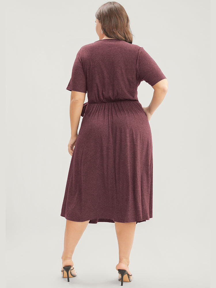 Solid Knot Side Pocket Surplice Neck Flutter Dress