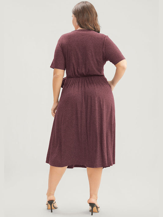 Solid Knot Side Pocket Surplice Neck Flutter Dress