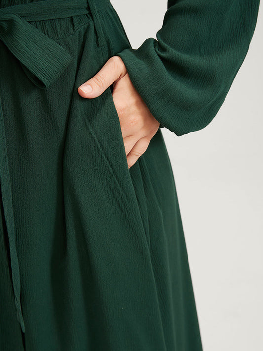 Solid Belted Lantern Sleeve Pocket Flutter Hem Dress