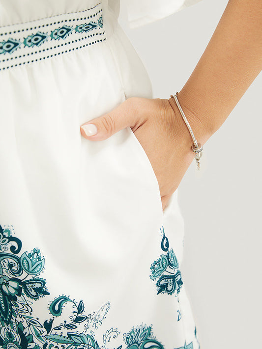 Bandana Print Ruffle Sleeve Pocket Button Detail Romper