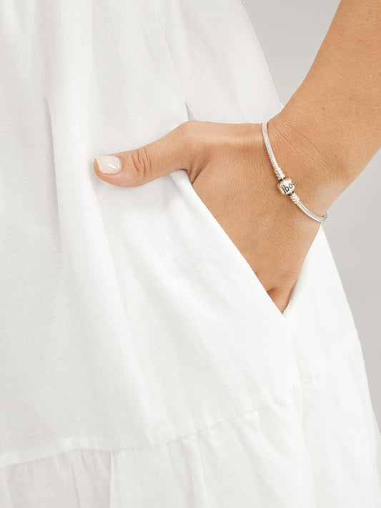 Solid Broderie Anglaise Pocket Flutter Hem Off Shoulder Dress