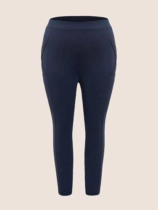 Plain Elastic Waist Crisscross Pocket Leggings